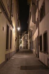 Fototapeta na wymiar narrow street at night