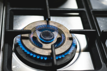 double black gas burner with blue flame