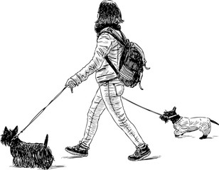 A townswoman with her pets goes for a walk
