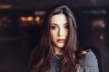 Fototapeta premium Close up portrait of brunette gorgeous beautiful girl on black background