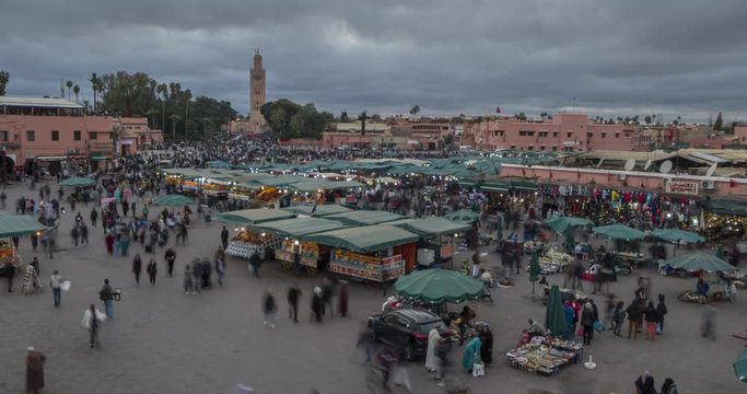Time lapse of Jemaa el Fna (Djemaa el Fnaa) Square, UNESCO World Heritage Site, at dusk, Marrakesh, Morocco, North Africa, Africa