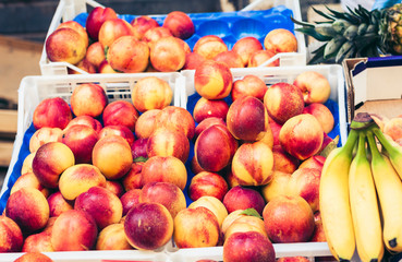 Various colorful fresh fruits in the fruit market, Catania, Sicily, Italy.
