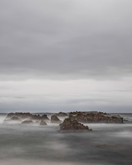 waves crashing on rocks
