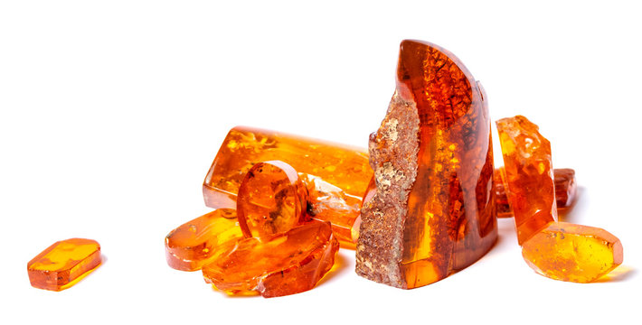 .Amber crystals on a white isolated background