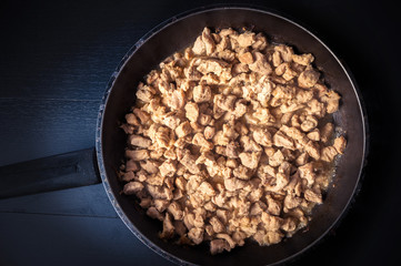 fried meat pieces in a pan
