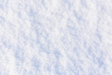 Texture of the white fluffy snow for background