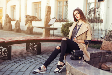 Gorgeous portrait of young fashion sexy caucasian sensual girl outdoors. Make up, beauty, fashion, glamour, luxury concept