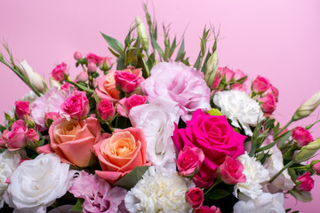 beautiful floral arrangement in the box, pink and yellow rose, pink eustoma, green and pink...