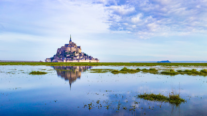 Fototapeta premium Mont-Saint-Michel reflecting in blue