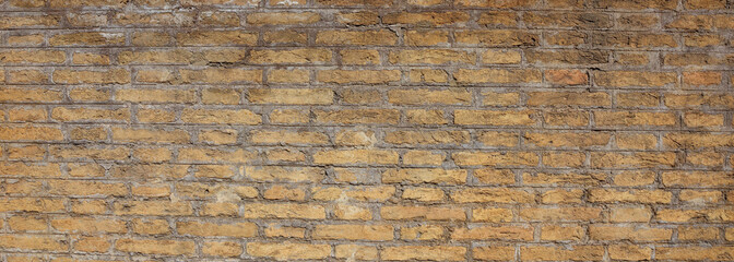 Beige concrete brick wall texture and background, banner