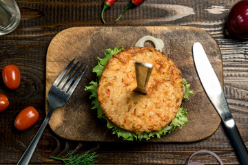 Healthy lifestyle, proper nutrition. Healthy rice burger with vegetables, herbs and cutlet