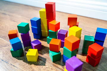 Colorful stack of wood cube building blocks