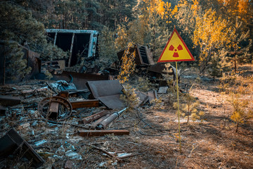 sign of radiation hazard on the background of radioactive garbage