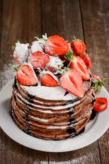 Stack of pancakes with strawberries