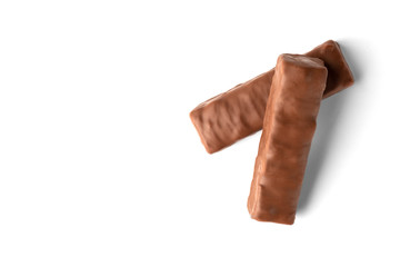 Chocolate bar with caramel and peanut isolated on white background. 