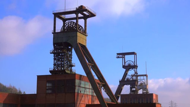 Old winding towers at Mining Museum Les Mineurs Wendel, Petite-Rosselle, Lorraine, France, Europe