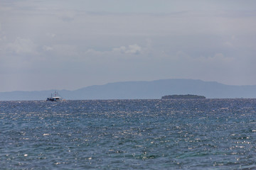 little Island in the sea a tourist spot and destination with outrigger boats for island hopping from Mactan island