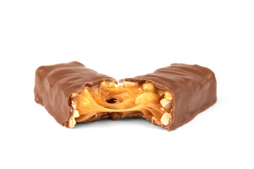 Chocolate bar with caramel and peanut isolated on white background. 