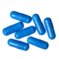 Capsule pills medicine pharmacy blue on white background isolation, top view