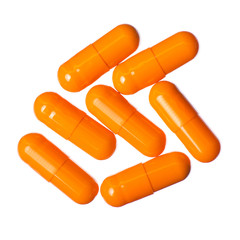 Capsule pills medicine pharmacy orange on white background isolation, top view