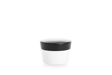 Studio shot of cream container with black cap isolated on white