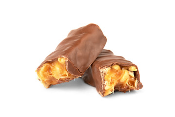 Chocolate bar with caramel and peanut isolated on white background. 