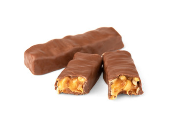 Chocolate bar with caramel and peanut isolated on white background. 