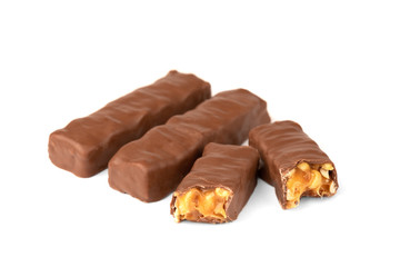Chocolate bar with caramel and peanut isolated on white background. 