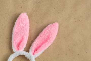 Top view of decoration symbol Happy Easter holiday. Bunny Ears on rustic Background concept. Free space for design.
