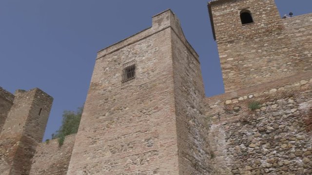View of the walls of Alcazaba from Jardines de Pedro Luis Alonso, Malaga, Andalucia, Spain, Europe