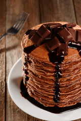 Melted chocolate on hot pancakes