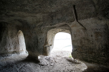 ancient cave hollowed out in the rock