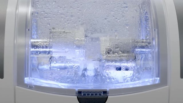 Dental milling machine CAD CAM grinds the dental prosthesis