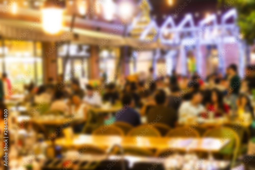 Poster abstract blur image of night festival in a restaurant and the atmosphere is happy and relaxing with 