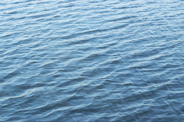 Water surface and ripple with reflection in the day for background concept.