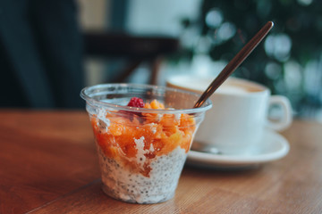 Chia pudding healthy dessert on the table in the cafe