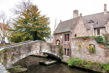 Fototapeta na wymiar Bonifacius Bridge at Hof Arents Sqaure in historic center of Bruges. Belgium.