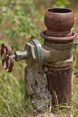 Old pipe with closing faucet