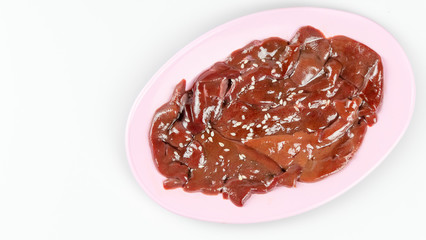raw pork liver on plate