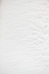 Winter fluted fluffy snow texture 