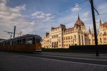 Naklejka na ściany i meble Budapest is the capital of Hungary.Beautiful big old town.The magnificent city is rich in history.The photo is made on a sunny day.City landscape with a wide large river.Beautiful buildings.Landscape.