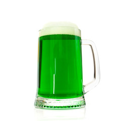 Large glass of green beer is isolated on a white background. Place for text for St. Patrick's Day holiday poster.