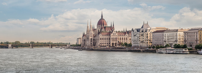 Budapest is the capital of Hungary.Beautiful big old town.The magnificent city is rich in history.The photo is made on a sunny day.City landscape with a wide large river.Beautiful buildings.Landscape.