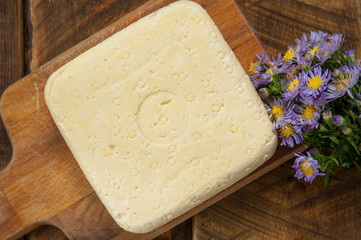 Homemade cheese top view.