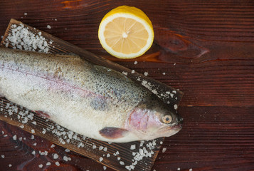 Raw trout lemon and coarse salt.