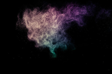 Fototapeta na wymiar powder of Galaxy and Nebula color spreading for makeup artist or graphic design in black background
