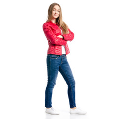 Obraz premium Beautiful woman in red jacket and jeans casual smile goes on white background isolation