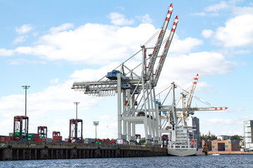 Hamburg, Germany - September 03, 2014: container cranes in a container terminal lightening a...