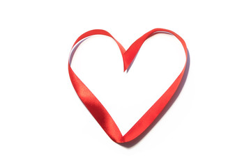 "Heart" written with red silk ribbon