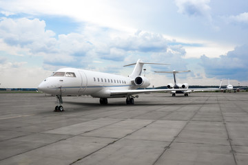 Business jet plane on the parking